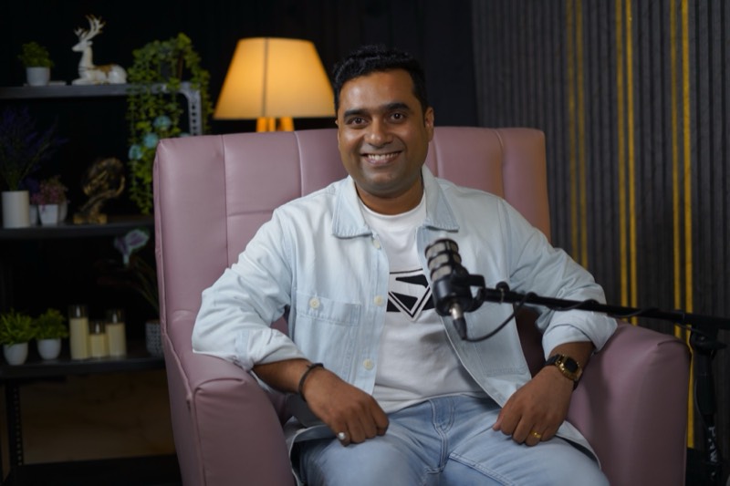 Ujjwal Abhishek seated in a podcast studio
